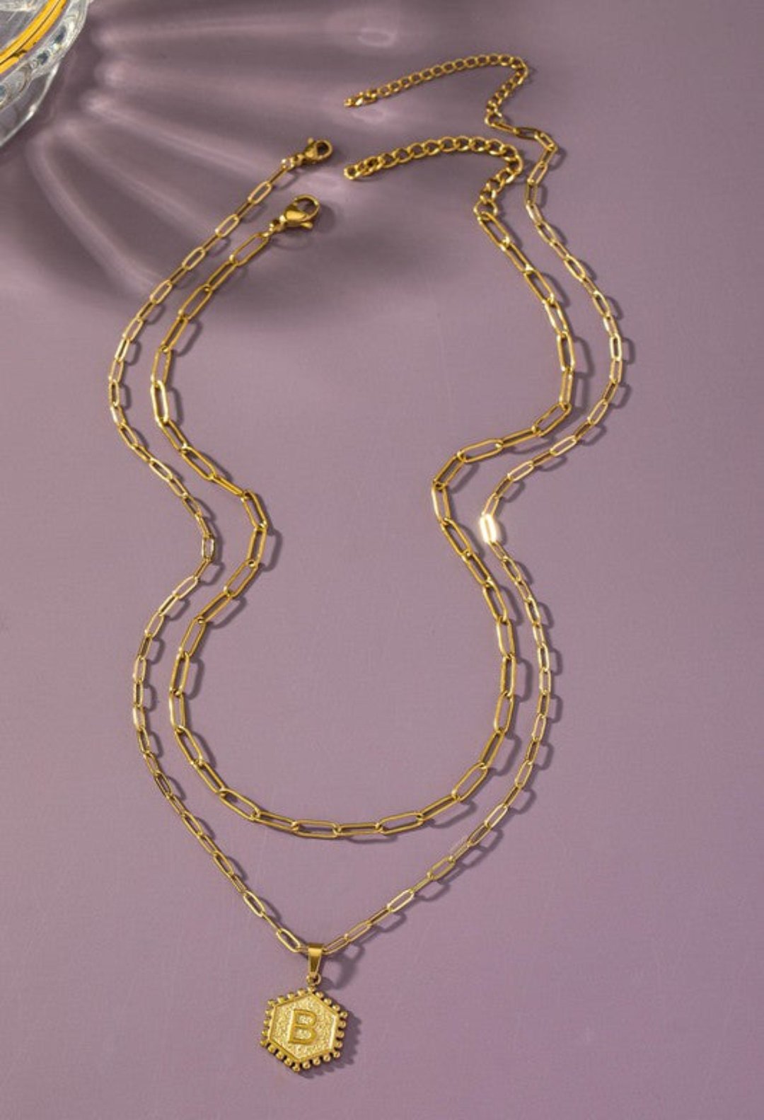 Double-sided, double-row brass hexagon initial necklace, jewelry fashion store miami, danias store miami jewelry , letter necklace miami store.