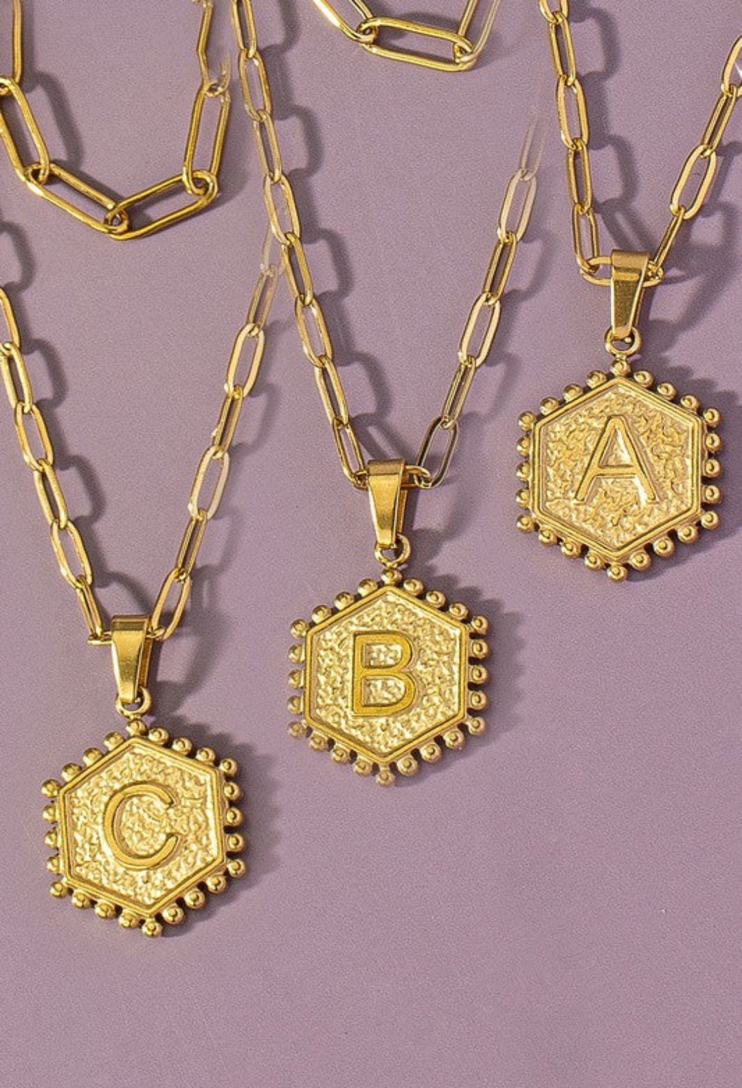 Double-sided, double-row brass hexagon initial necklace, jewelry fashion store miami, danias store miami jewelry , letter necklace miami store.  