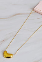 Bold Gold Molten Heart necklace, jewelry fashion store miami, danias store miami jewelry , heart necklace miami store.  