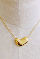 Bold Gold Molten Heart necklace, jewelry fashion store miami, danias store miami jewelry , heart necklace miami store.  