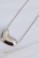 Bold Gold Molten Heart necklace, jewelry fashion store miami, danias store miami jewelry , heart necklace miami store.  