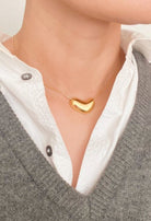 Bold Gold Molten Heart necklace, jewelry fashion store miami, danias store miami jewelry , heart necklace miami store.  